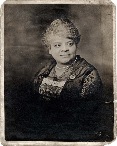 Ida B. Wells-Barnett, wearing "Martyred Negro Soldiers" button, circa 1917-1919